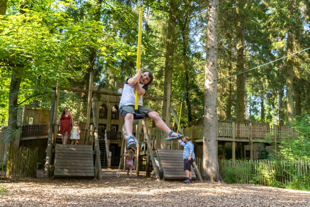 children playing on the adventure playground at lowether castle