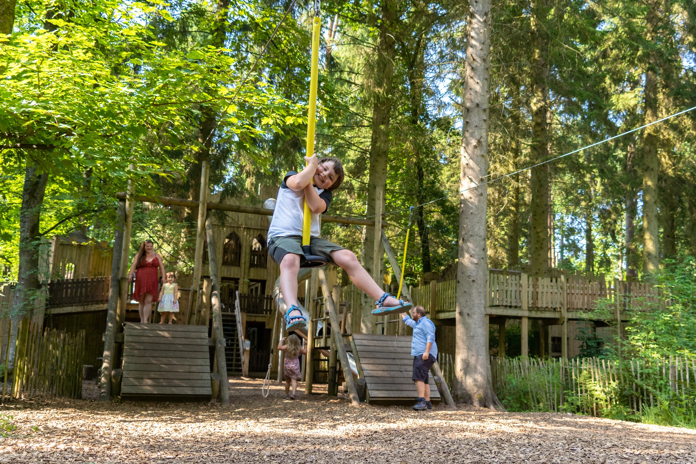 children playing on the adventure playground at lowether castle