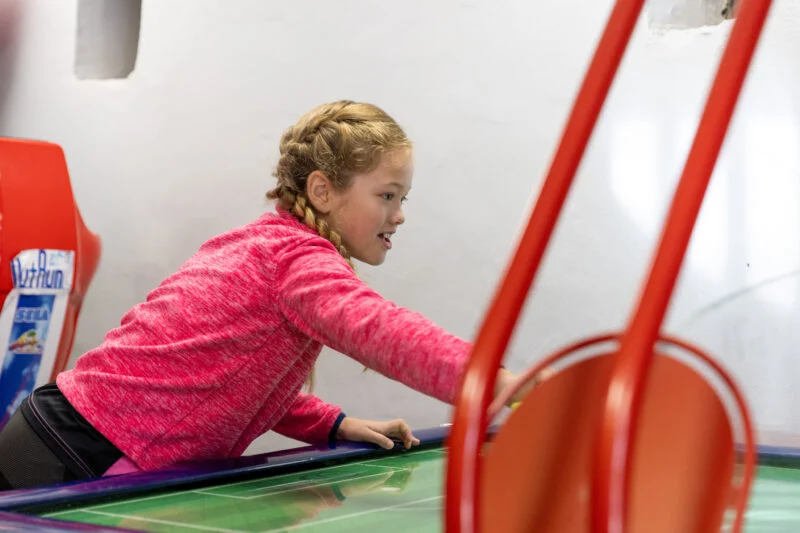 Girls playing at indoor games room