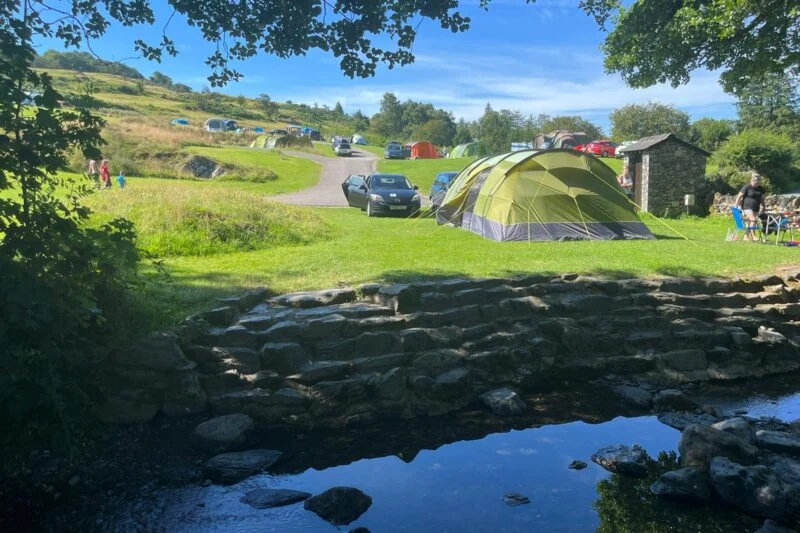 River adjacent to Park Cliffe Camping