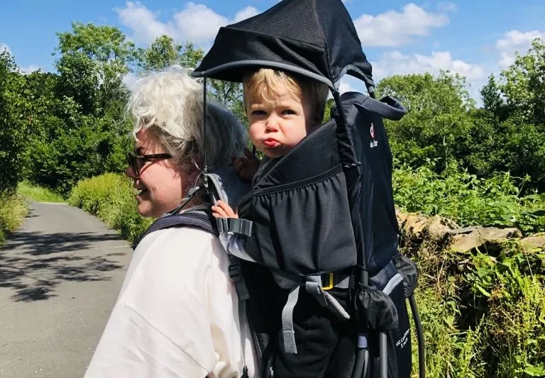 baby in carrier on lake district walk