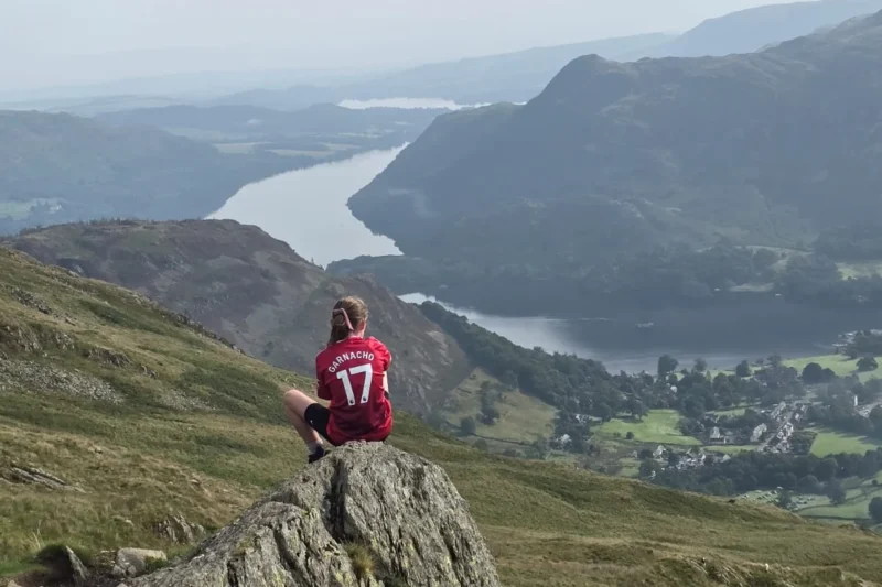 child with view of lake district