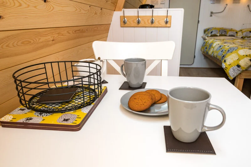 deluxe camping pod clothing rail cup of tea