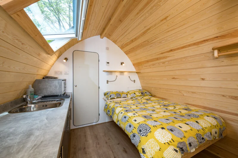 deluxe camping pod living area