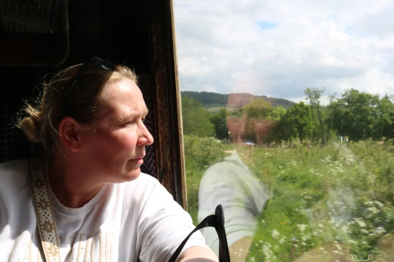 lady looking out of train window