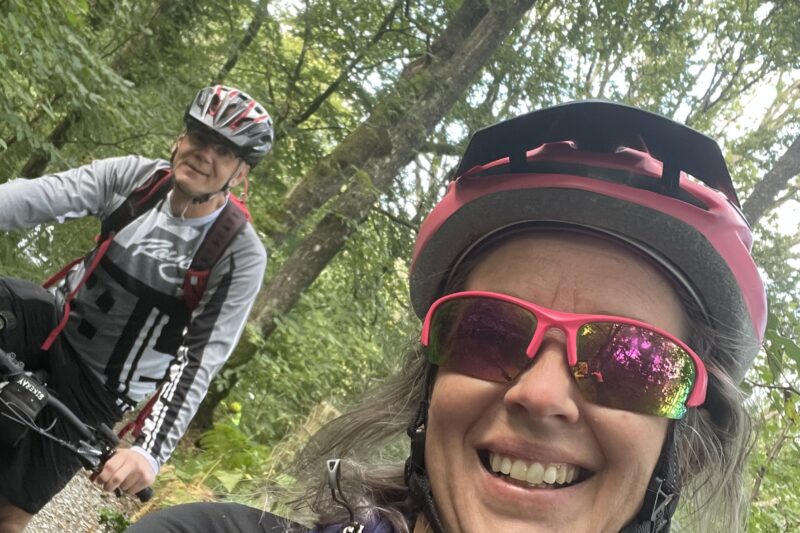 couple cycling in the lake district