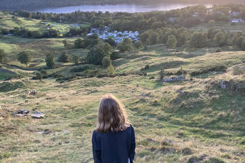 child admiring view over park cliffe and windermere