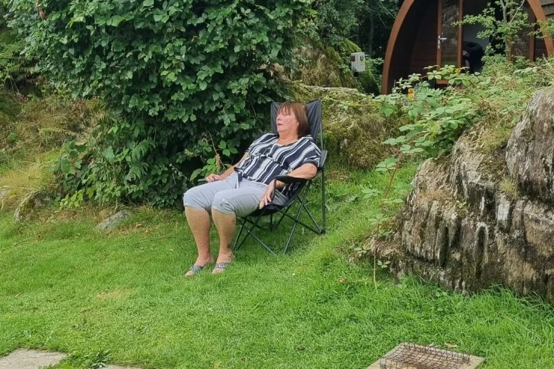 park cliffe relaxing outside of pod