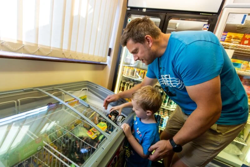 Kid and Dad at Park Cliffe Shop Lake District