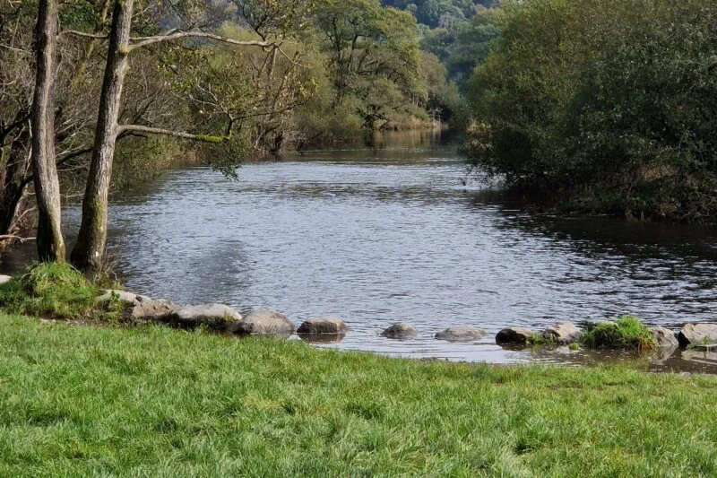 river and hills in the lake district
