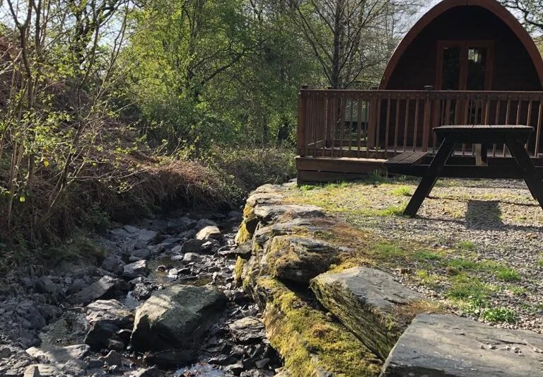 Camping pod by the river glamping in the Lake District