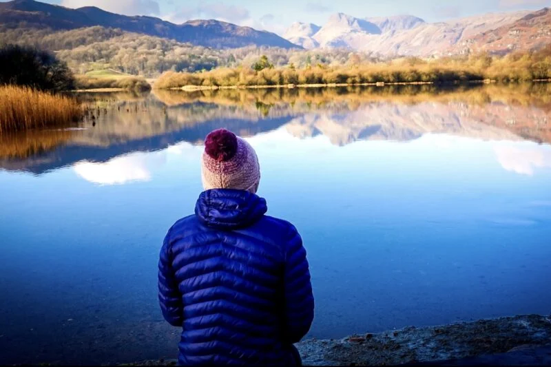woman overlooking lake in the lake district