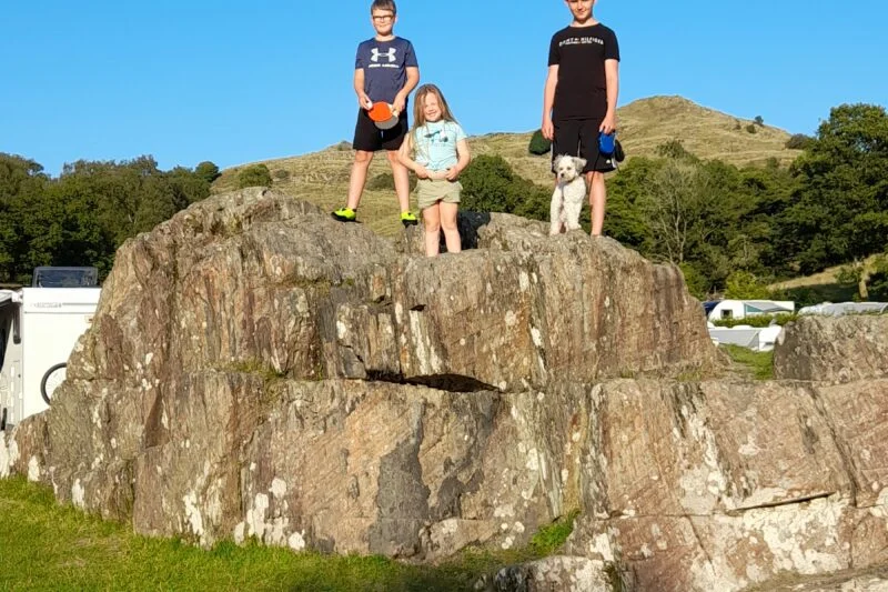 children playing on top of rock in the Lake District