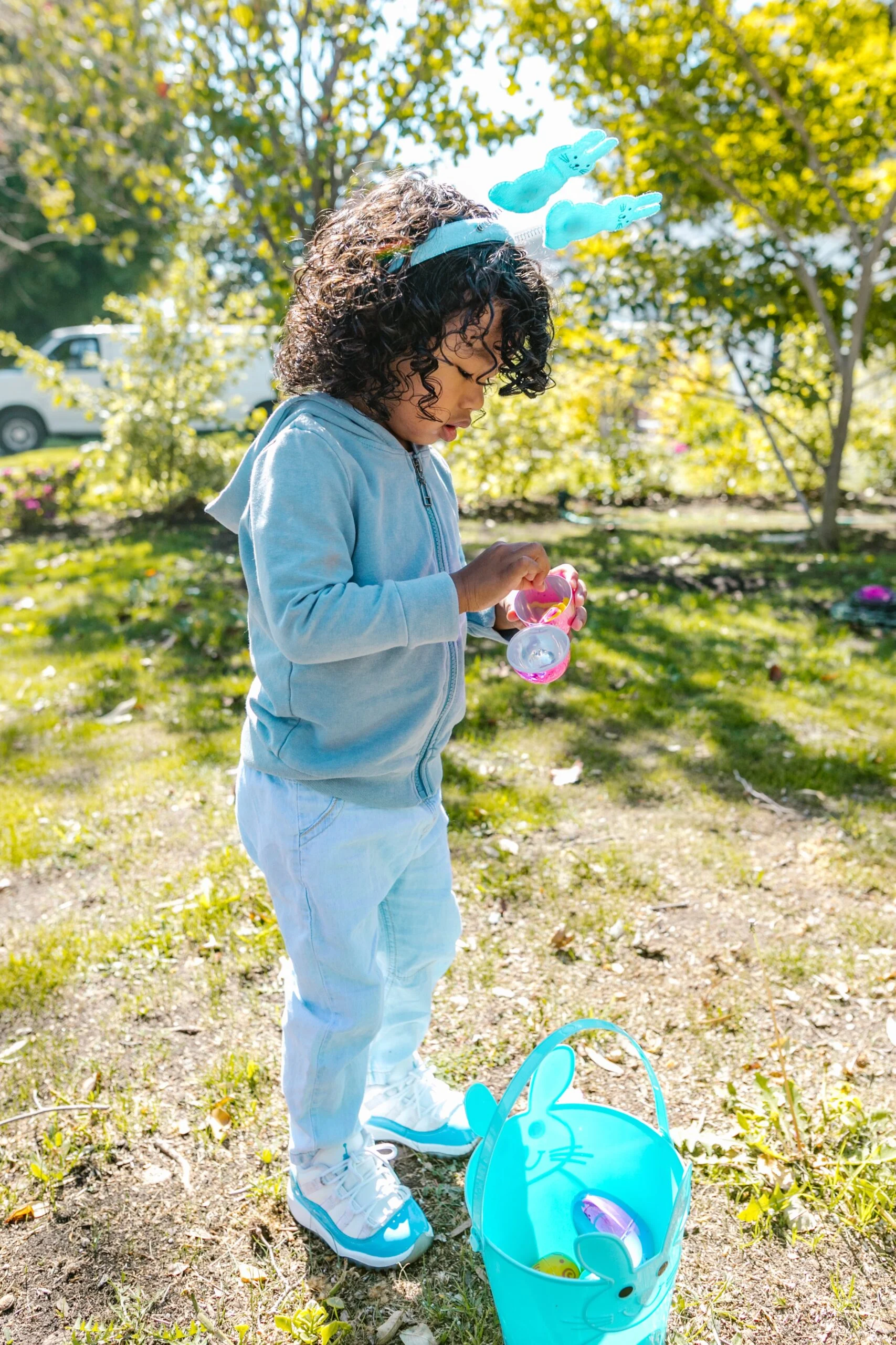 little girl on easter egg hunt
